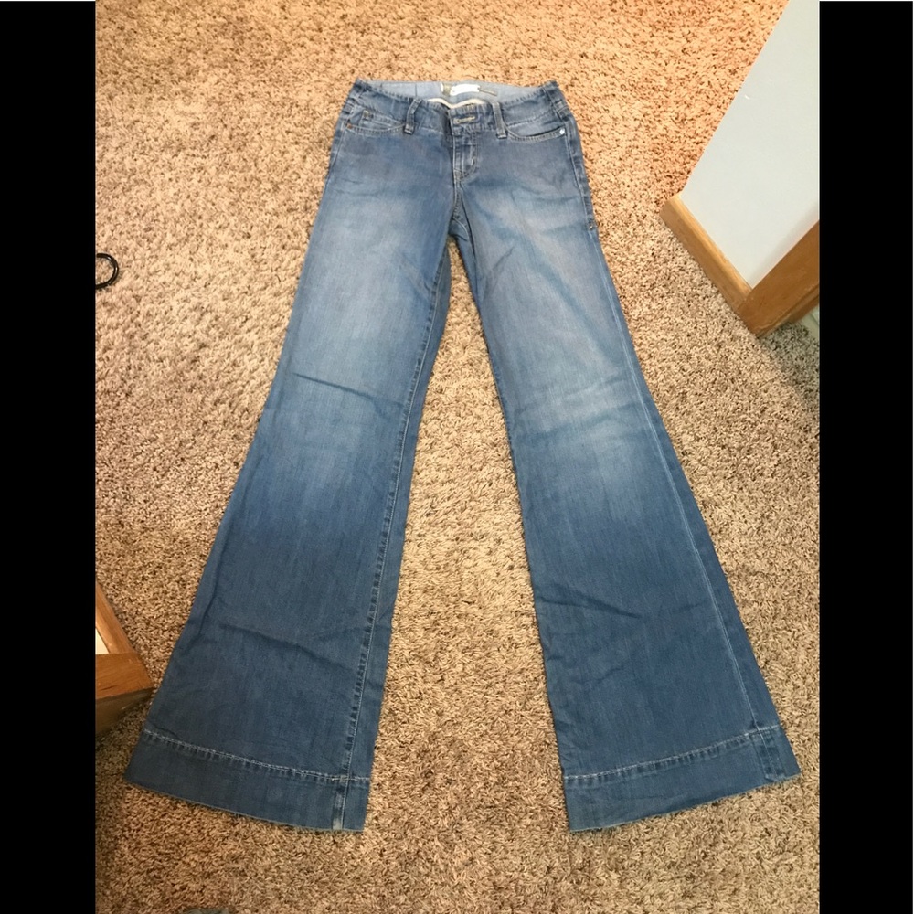 Level 99 bellbottom jeans, slightly worn.